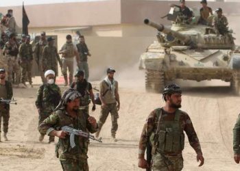 البوكمال: مليشيات إيران تُنزِلُ علم النظام