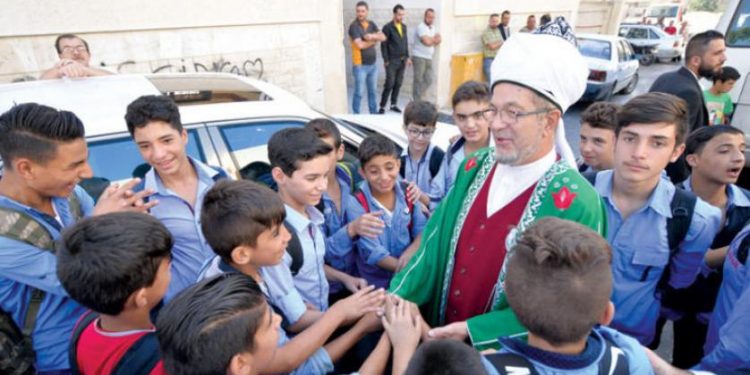 روسيا تدخل خط التنافس الديني مع إيران على الساحة السورية